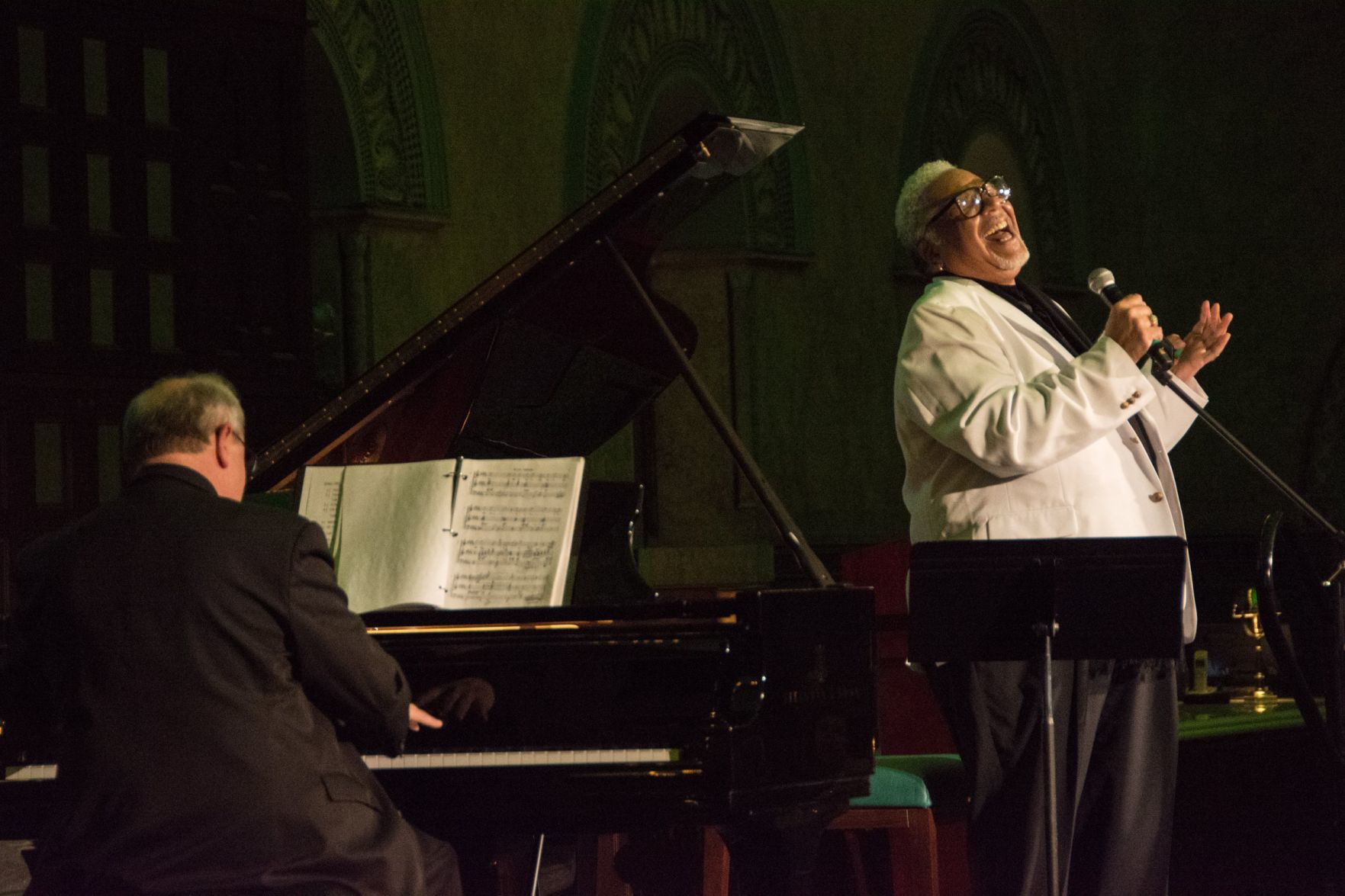 Greg Schweizer on the Piano, Ken Page of the Muny sings at the Saint Louis Cathedral Concerts Gala